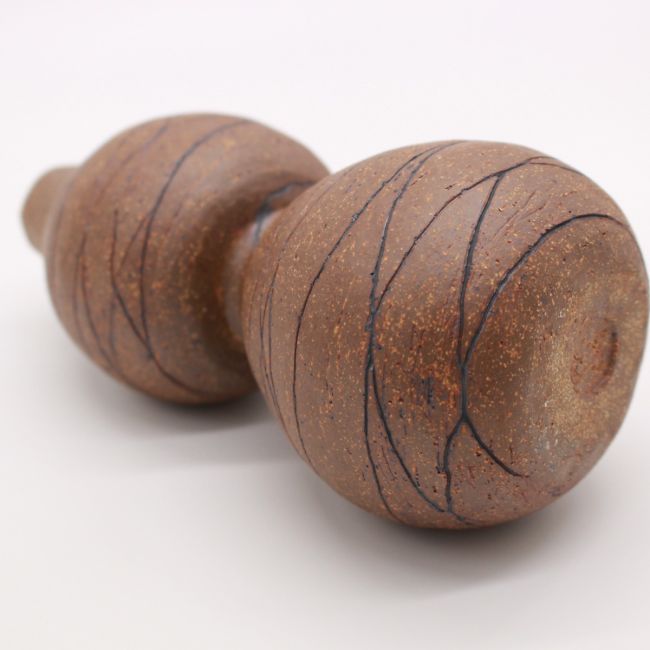 Lines Woven on Clay Oil Bottle